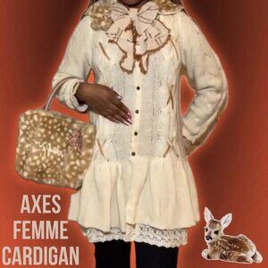 axes femme cardigan it has buttons, lace, and frills